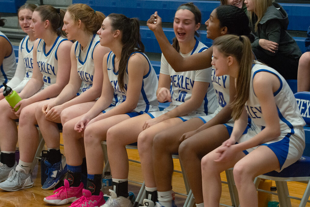 Bexley High School girls basketball team on bench