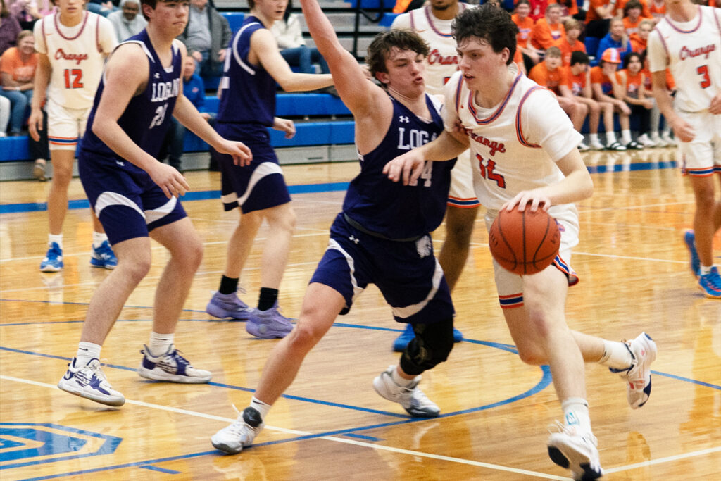 Olentangy Orange player Mikey McCollum heads down lane against Logan