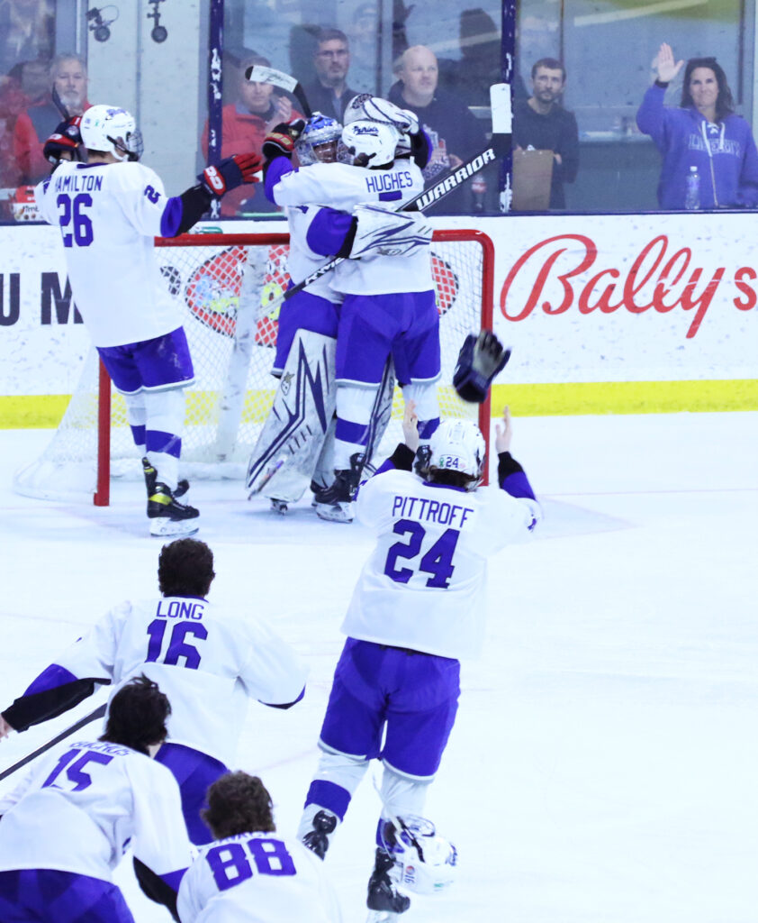 Liberty hockey celebrates victory on the ice