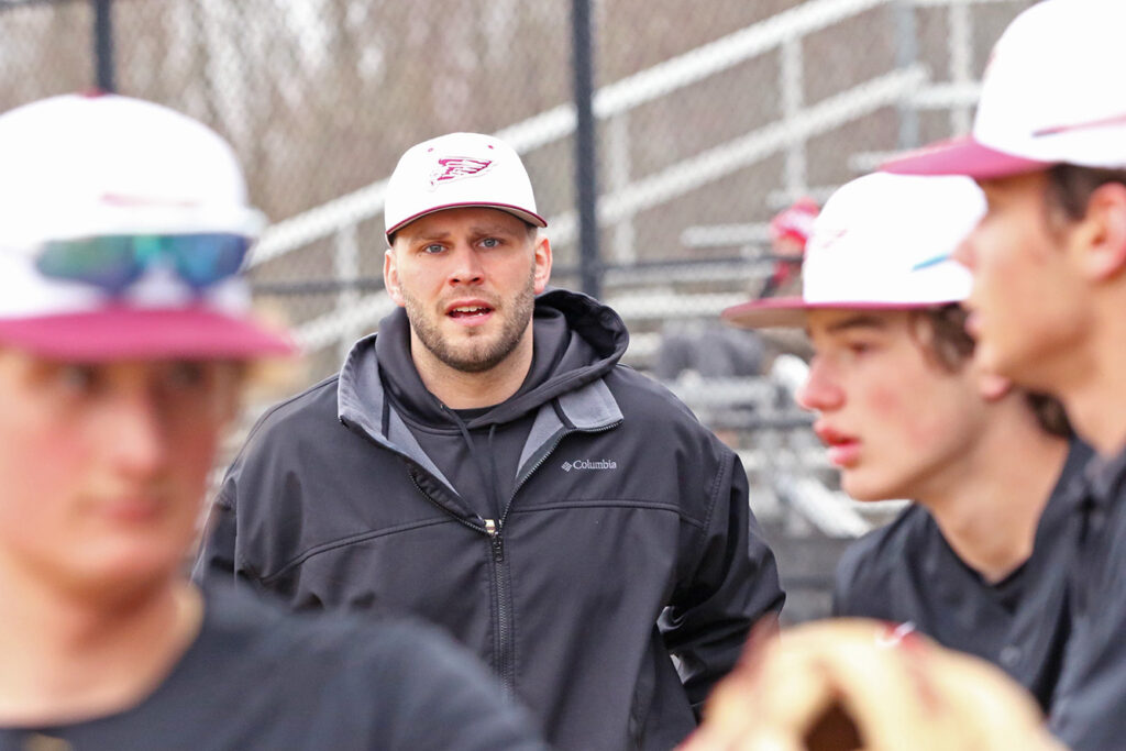 New Albany coach Michael Sandman in dugout
