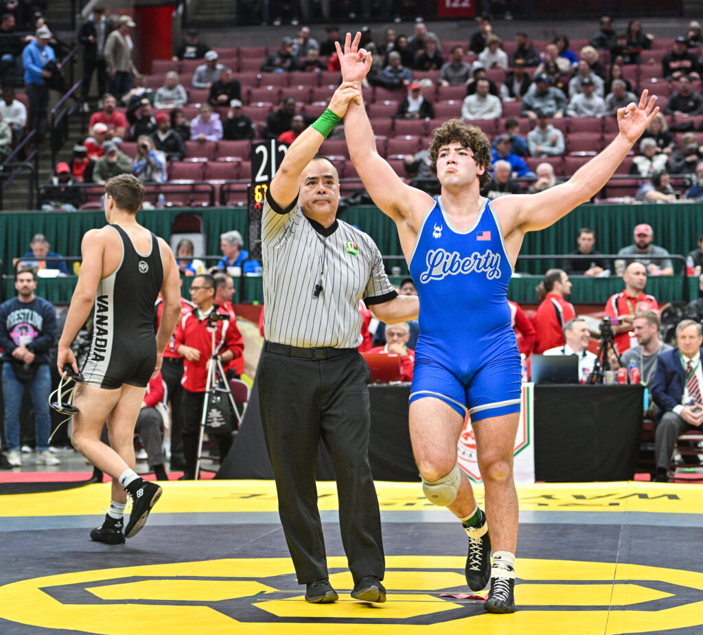 Marysville's Dylan Russo celebrates wrestling win