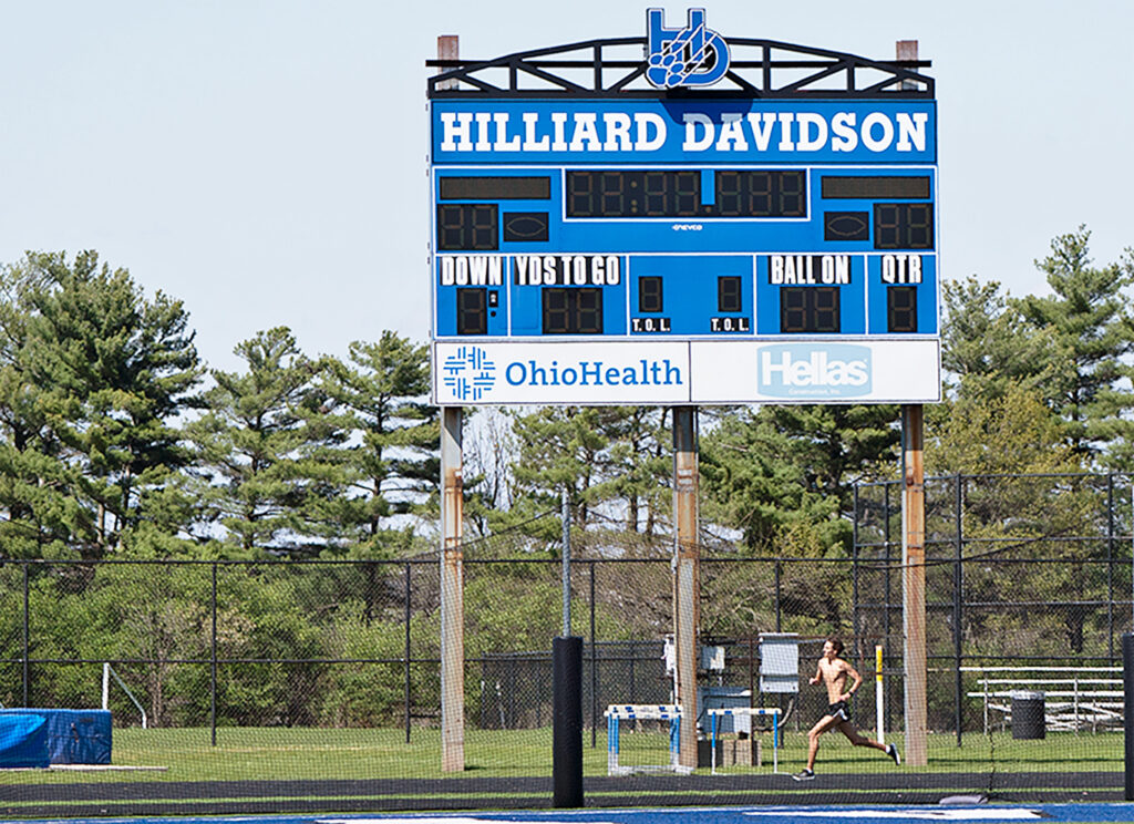 Hilliard Davidson's Connor Ackley runs on track