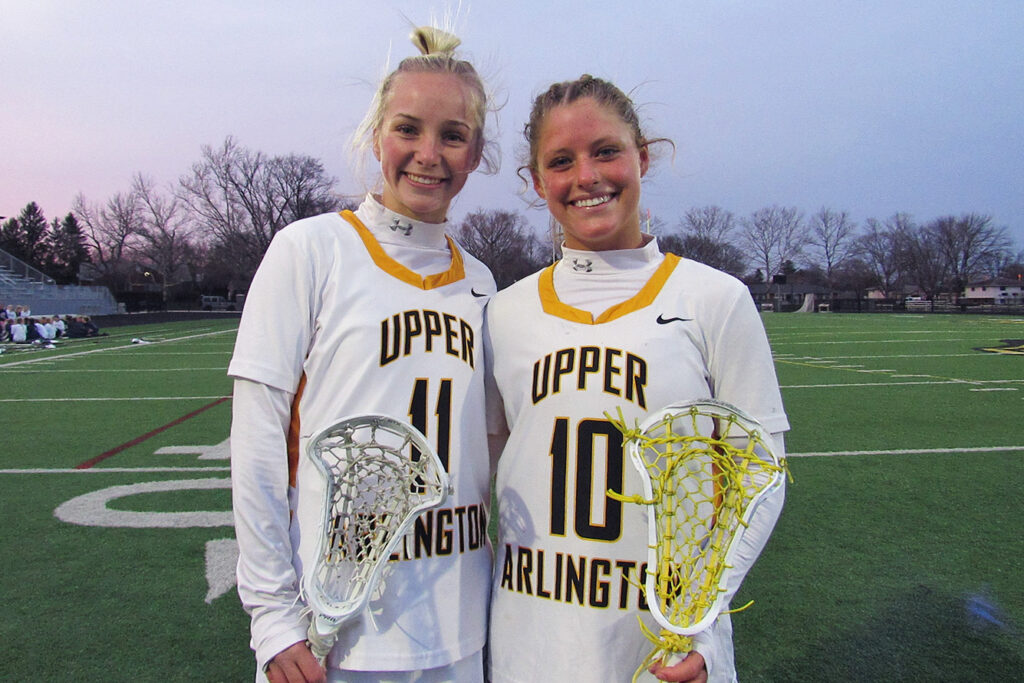 UA girls lacrosse players Schoemer and Stone