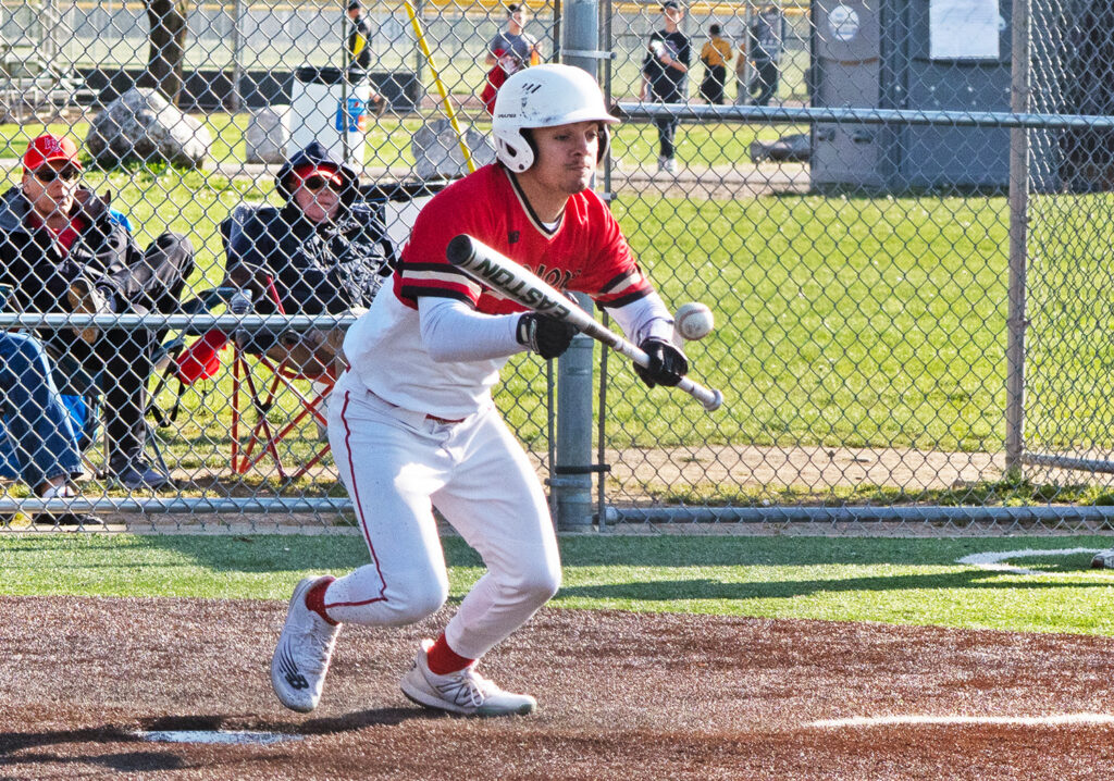 Worthington Christian's Hobie Raikes bunts