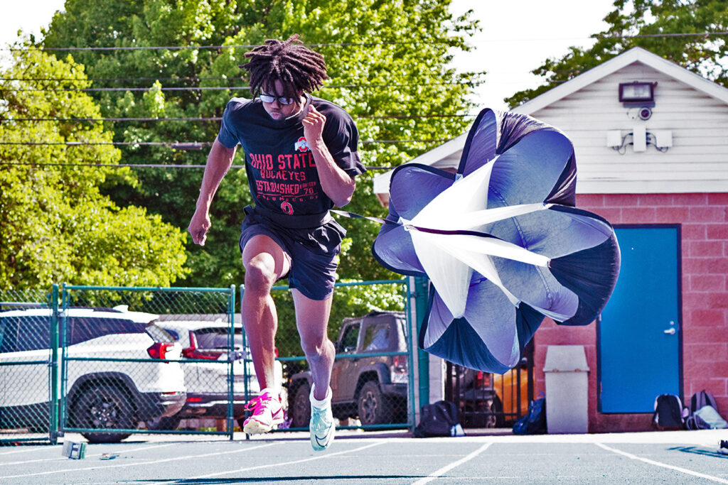 Bexley sprinter Mason Louis practices with parachute