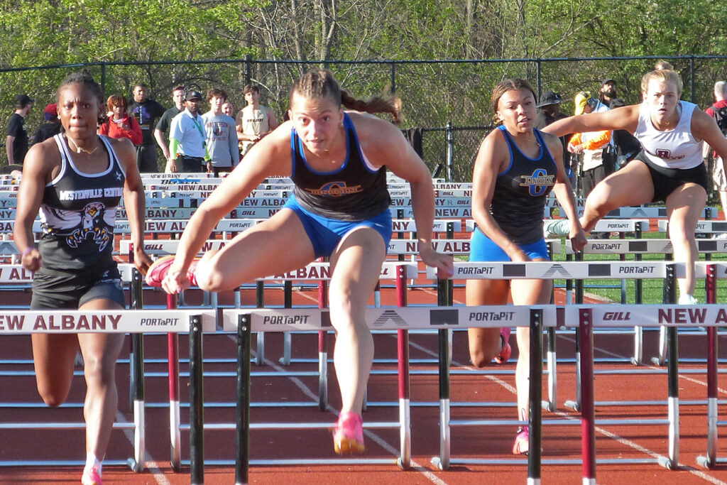 Gahanna's Camden Bentley competes in hurdles