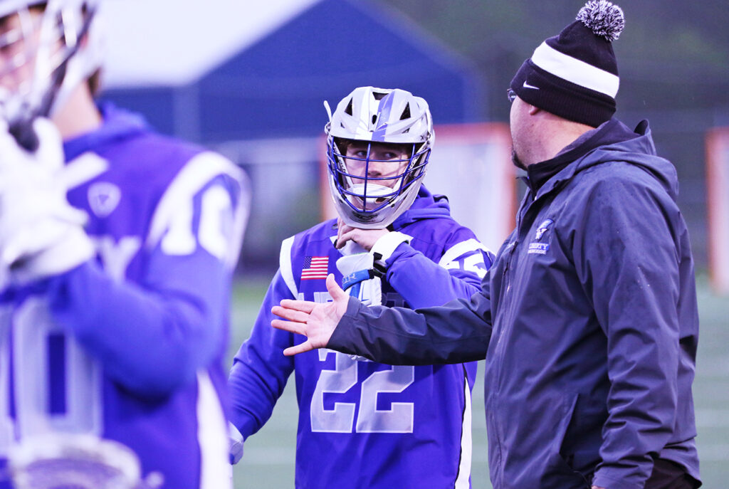 Olentangy Liberty's Ethan Brooks with coach