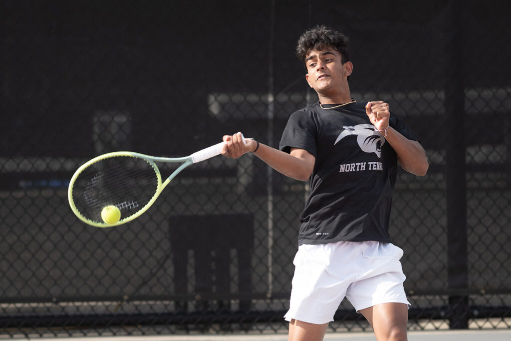 Pickerington North's Pavan Uppu hits tennis ball