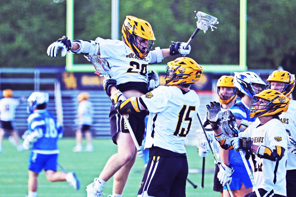 Upper Arlington boys lacrosse team celebrates