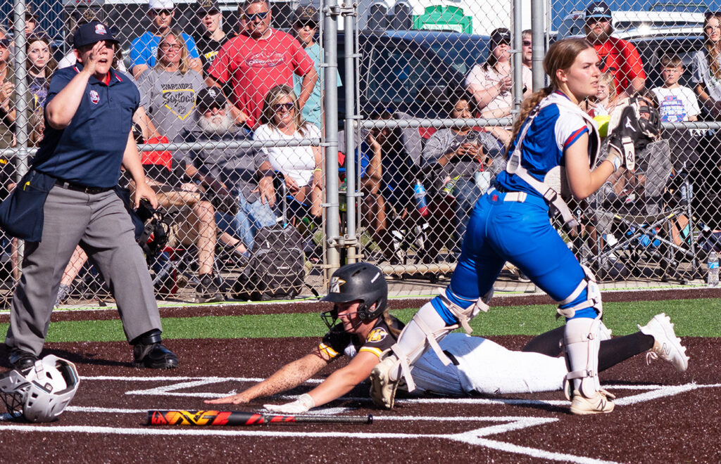 Watkins Memorial's Cortney Dobbs slides home