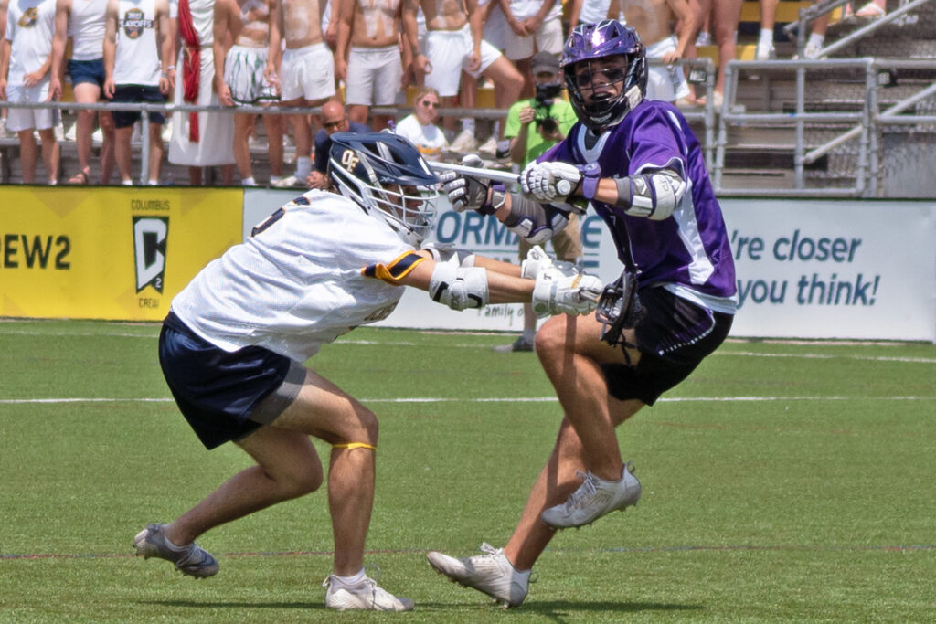 DeSales' Ryan Lee checked in lacrosse