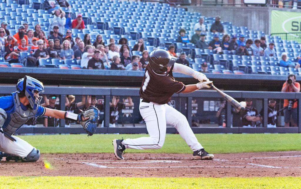 Heath's Connor Corbett swings