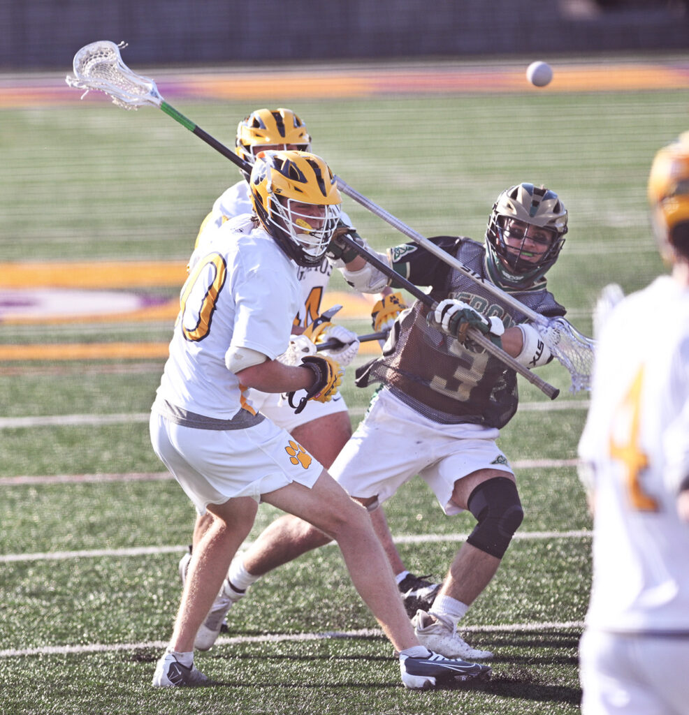 Dublin Jerome's Cael Haqq shoots in lacrosse