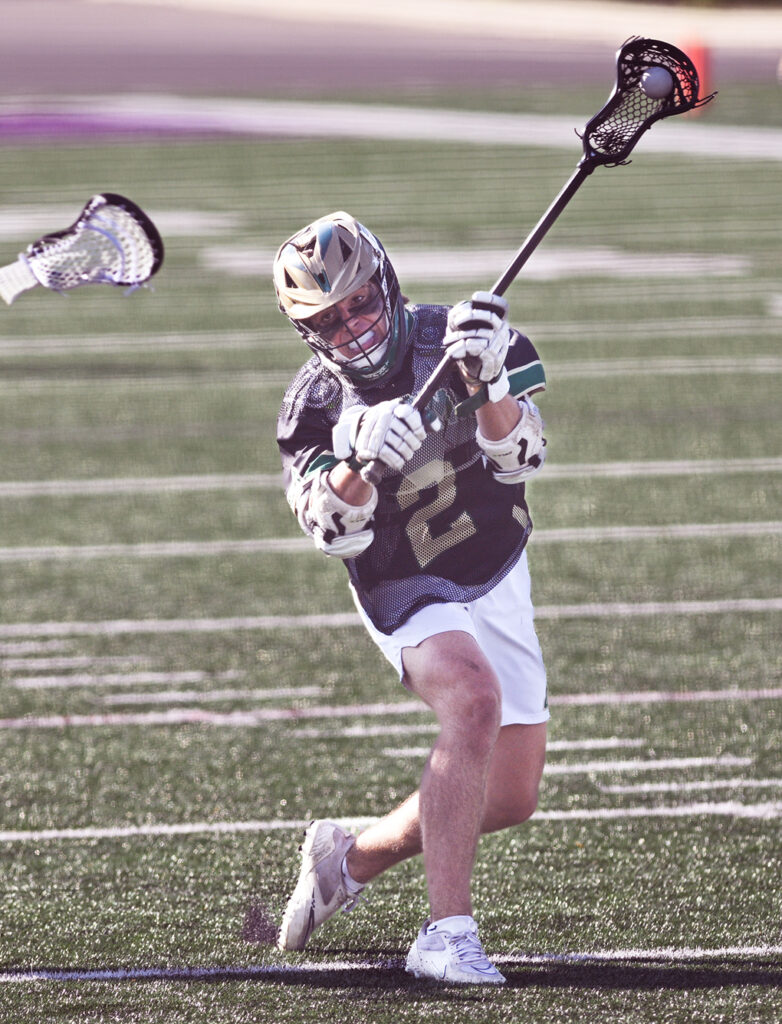 Dublin Jerome's Kyle White shoots in lacrosse