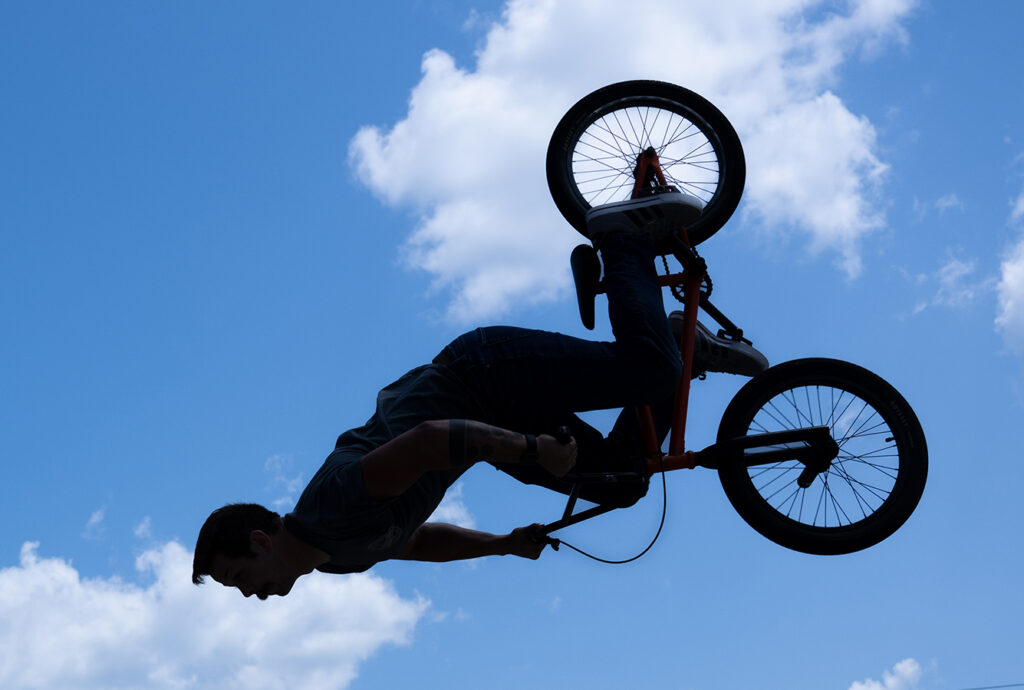 Extreme bike trick in silhouette