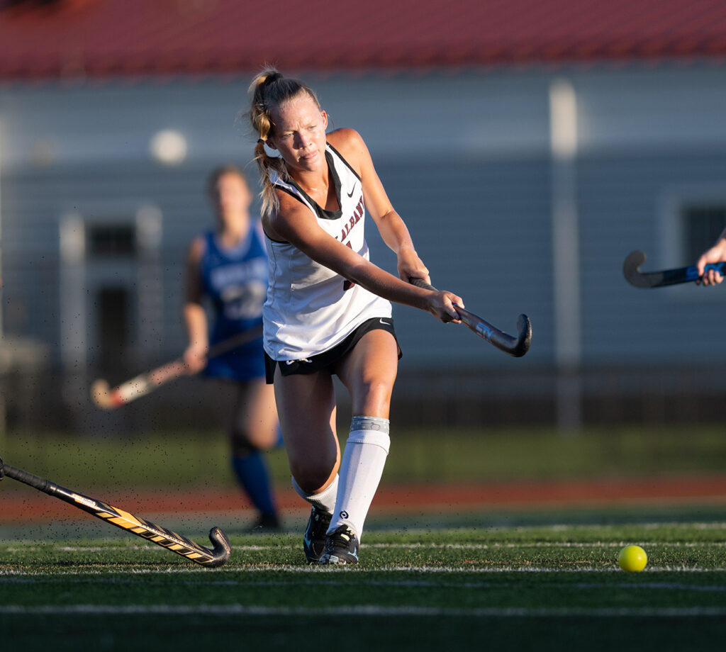 New Albany's Paige Cornelius attacks during field hockey match