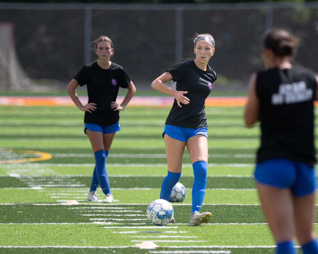 Olentangy Orange soccer player Lauryn Barringer warms up