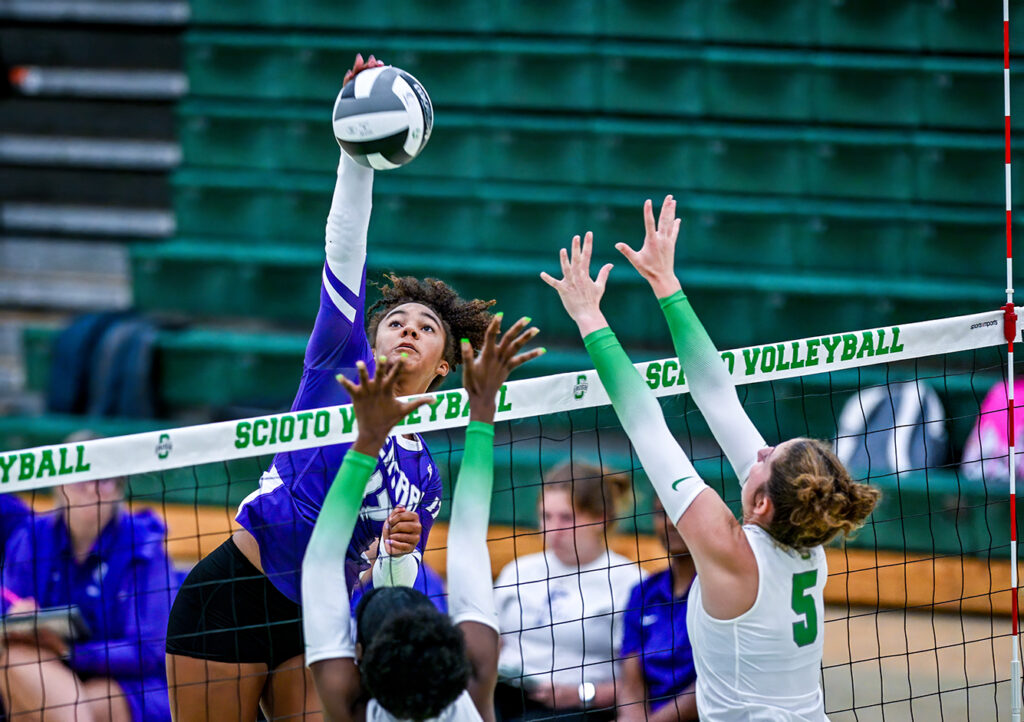 Pickerington Central's Myriah Massey hits volleyball