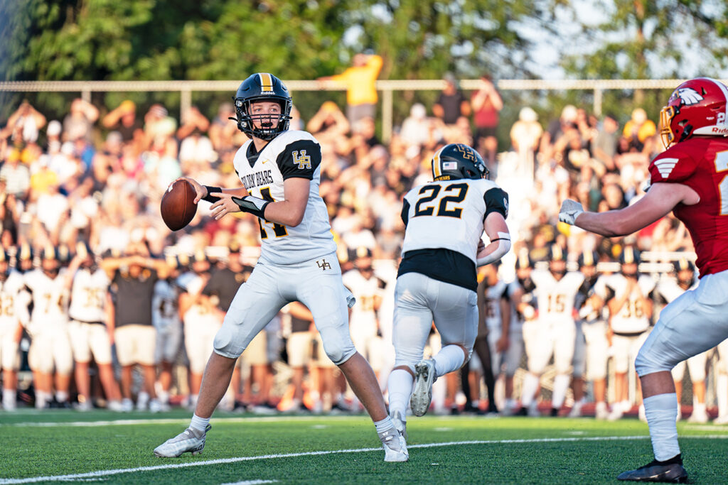 Upper Arlington quarterback Kyle Cox looks to throw