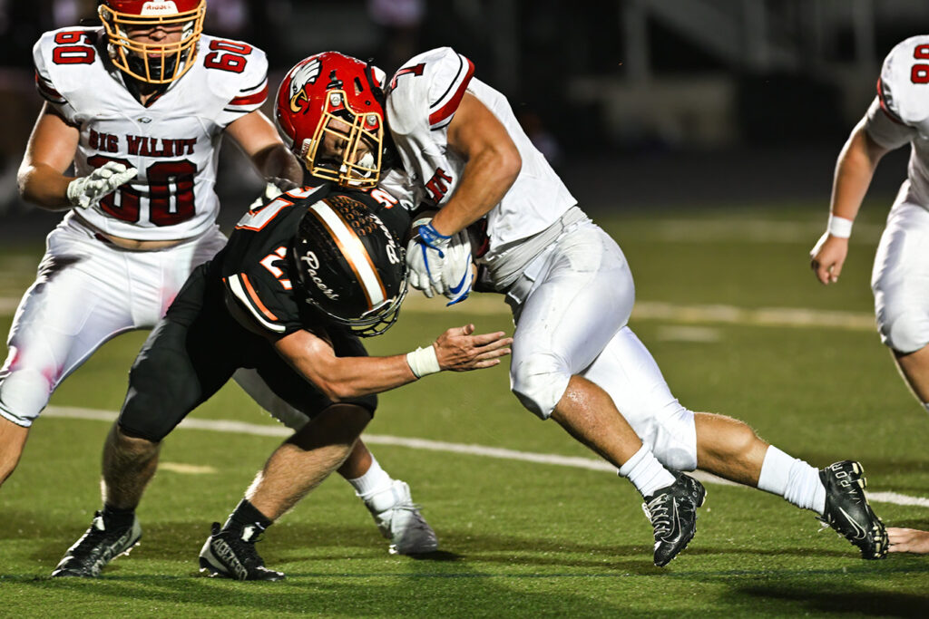 Big Walnut's Nate Severs runs football