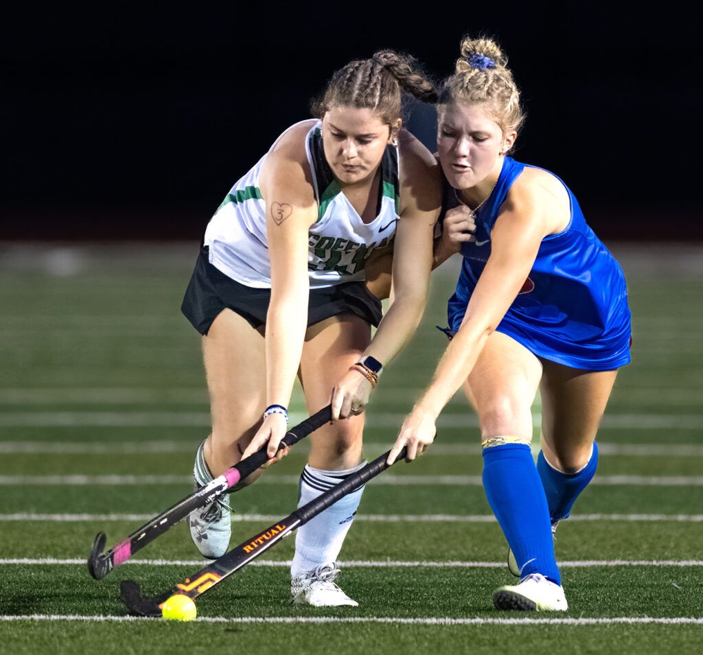 Dublin Coffman and Olentangy Orange field hockey players battle