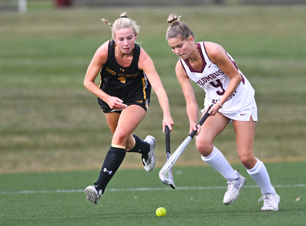 Columbus Academy and Upper Arlington field hockey players compete