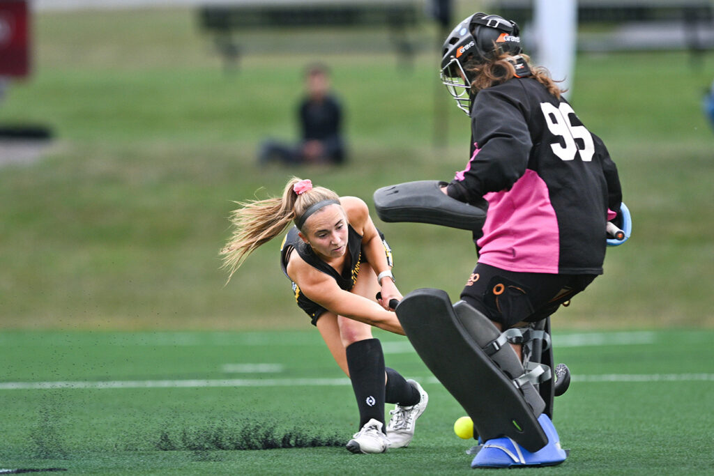 Columbus Academy field hockey goalie Sydney Lesh makes save