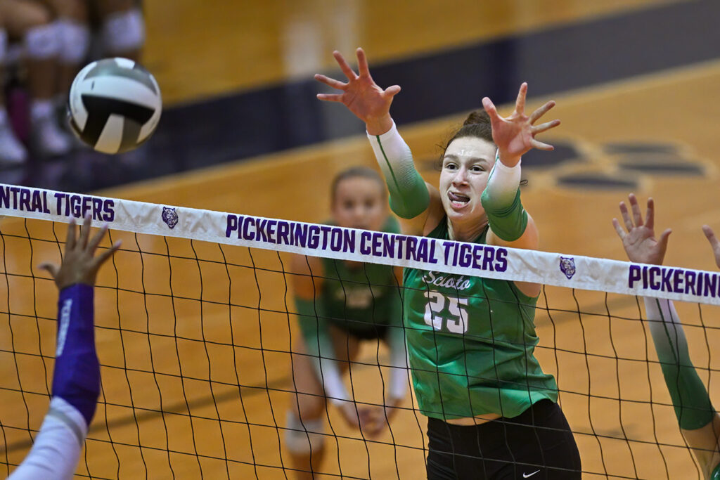 Dublin Scioto's Alec Rothe at volleyball net