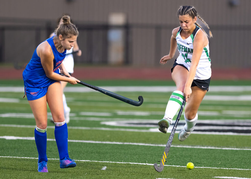 Olentangy Orange and Dublin Coffman field hockey players battle