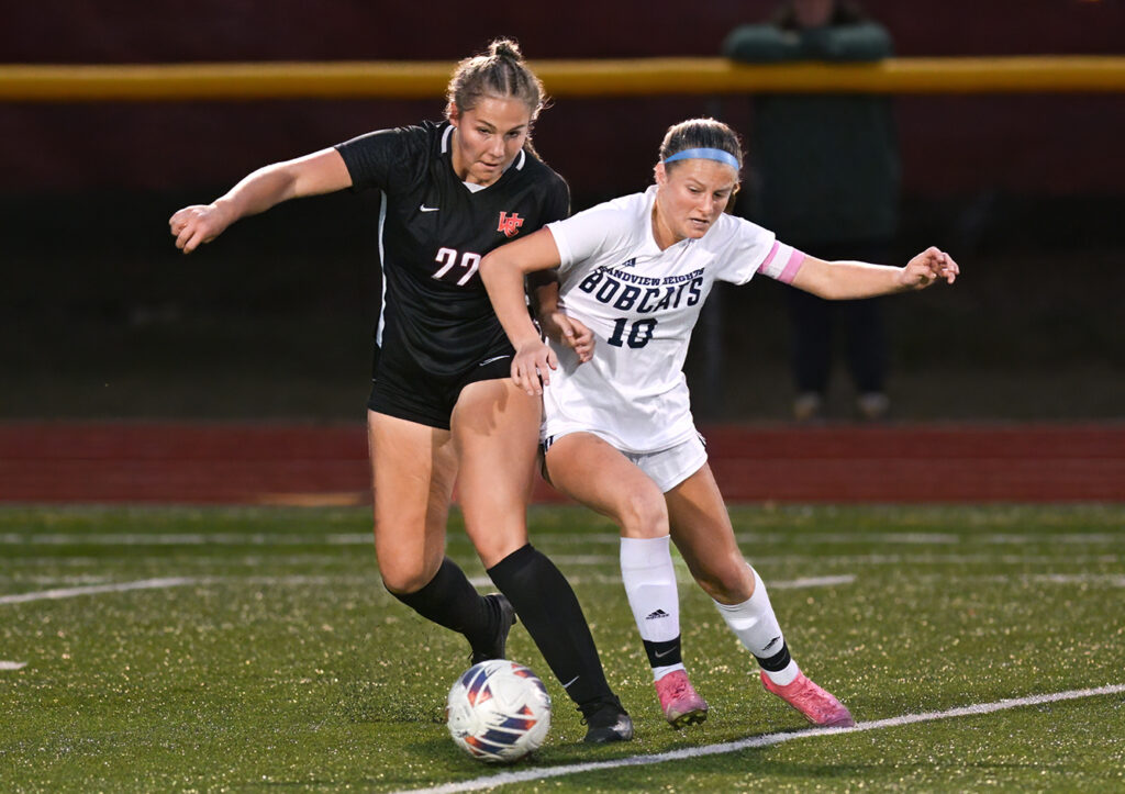 Worthington Christian and Grandview Hts girls soccer players battle for ball