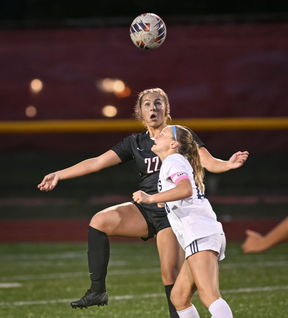 Worthington Christian and Grandview Hts girls soccer players fight for ball