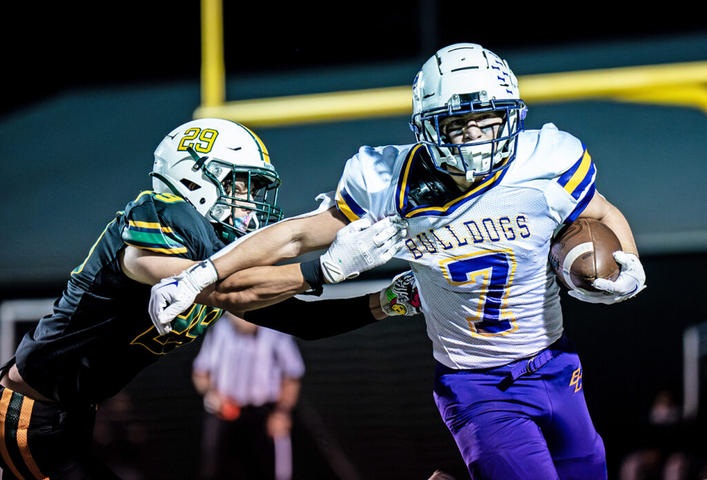 Bloom-Carroll's Dylan Armentrout evades a tackle