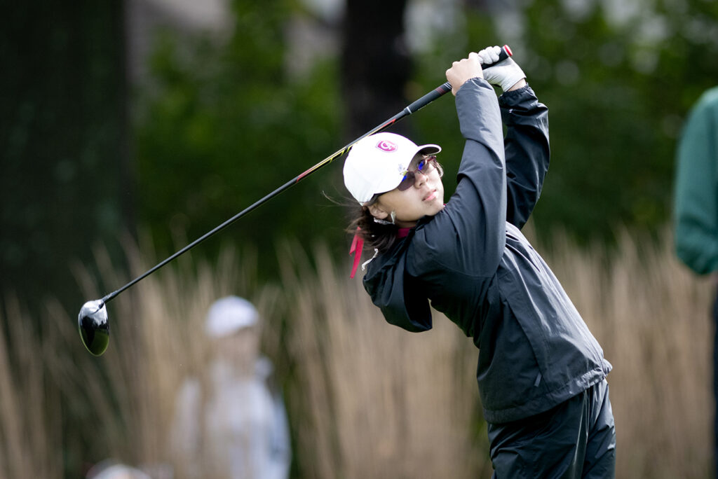 Columbus Academy's Eva Lim hits golf ball