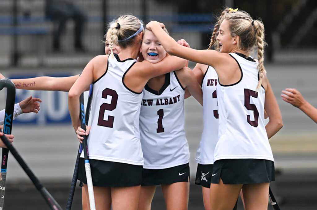 New Albany's Paige Cornelius congratulated for goal