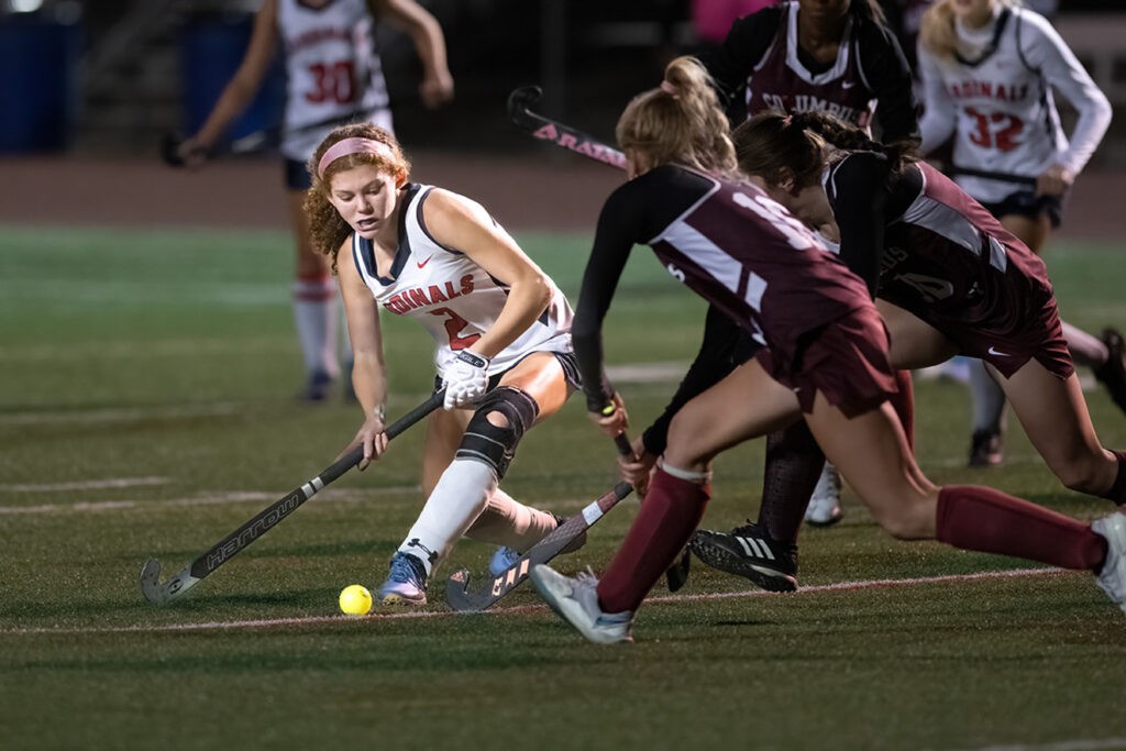 Thomas Worthington's Sophia Borghese shoots in field hockey match