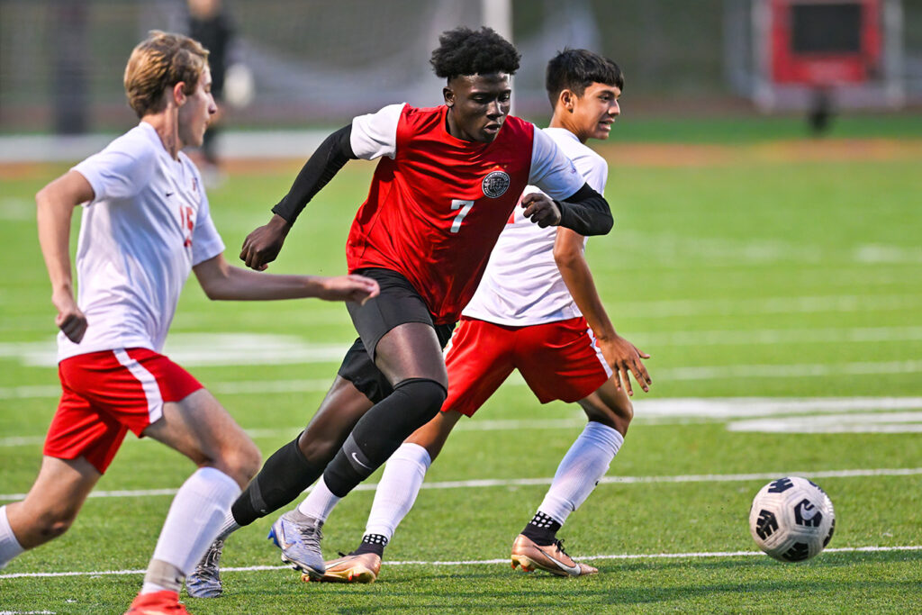 Worthington Christian's Sammy Owusu-Sarfo dribbles soccer ball