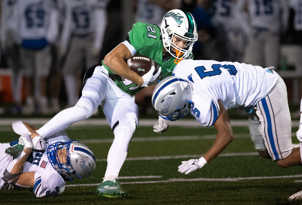 Dublin Coffman’s Cameron Hairston tackled after catch