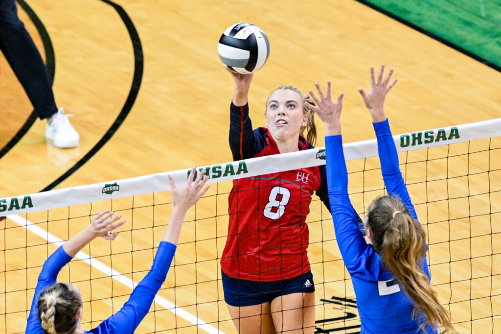 Bishop Hartley’s Kaylee Musick hits volleyball at net