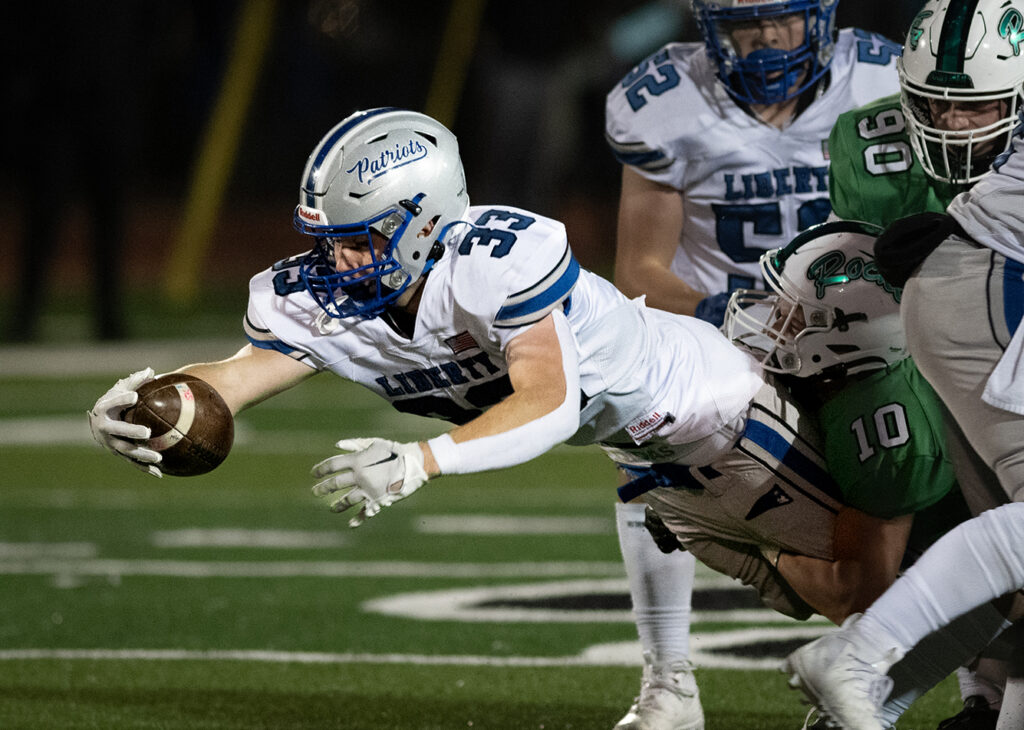 Olentangy Liberty’s Jake Struck lunges with football