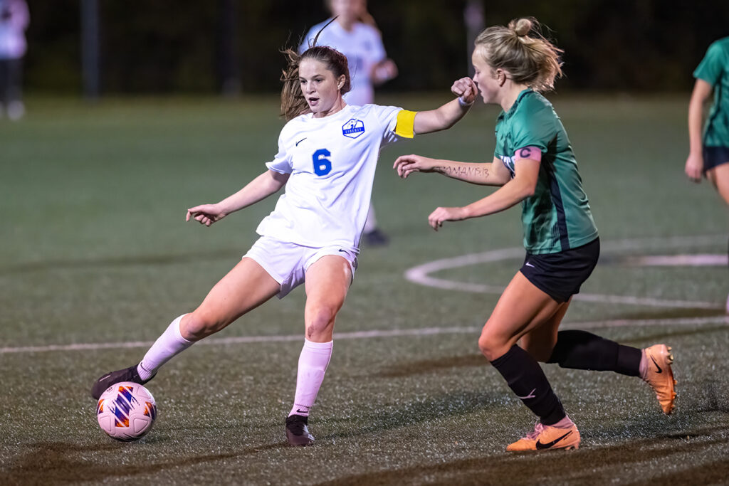 Olentangy Liberty’s Maddy McCort kicks soccer ball