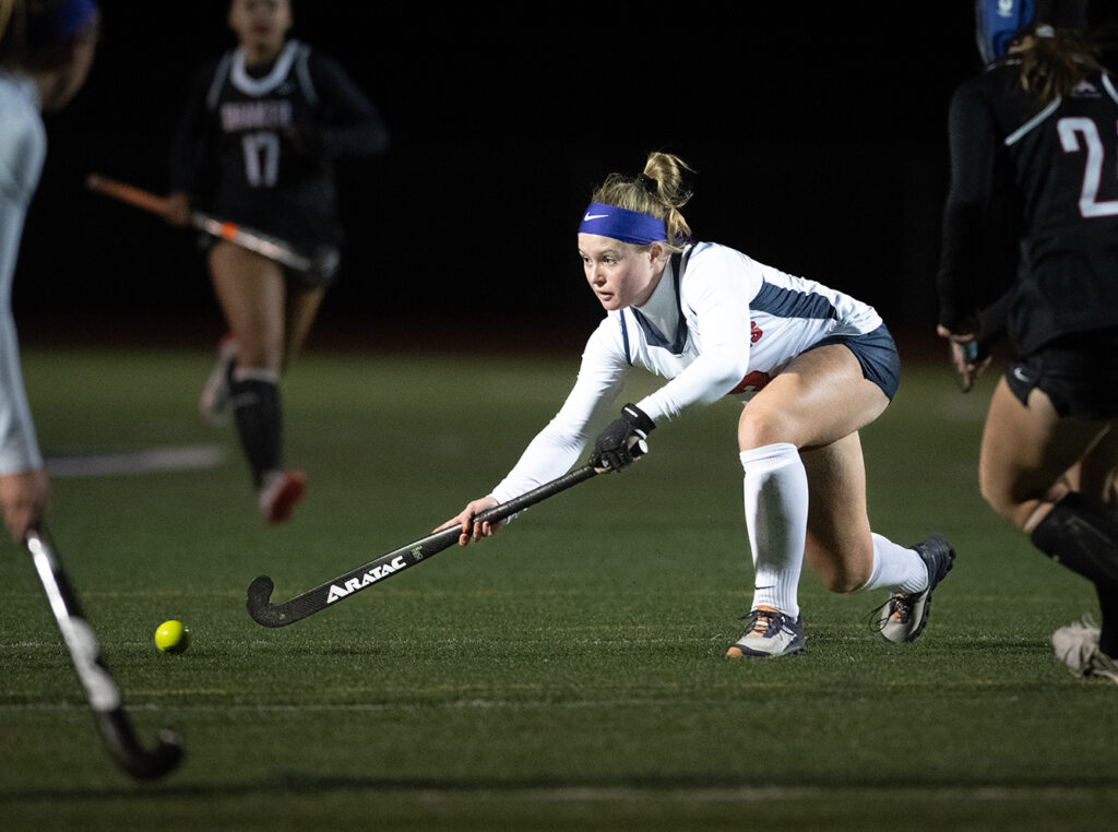 Thomas Worthington’s Emmy Wellejus shoots in field hockey