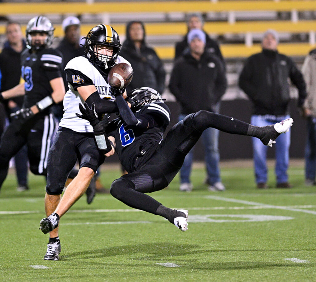 UA's Zach Corna breaks up a pass