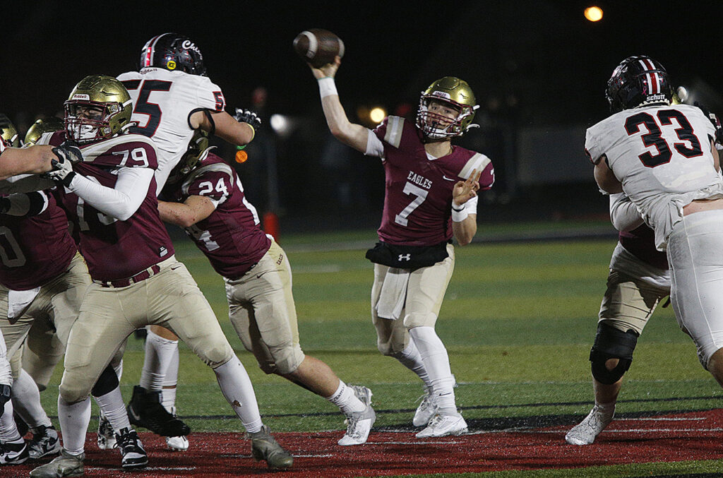 Watterson's AJ McAninch throws football