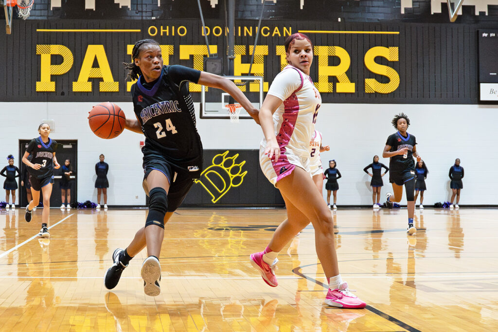 Africentric's Kamryn Grant drives to the hoop