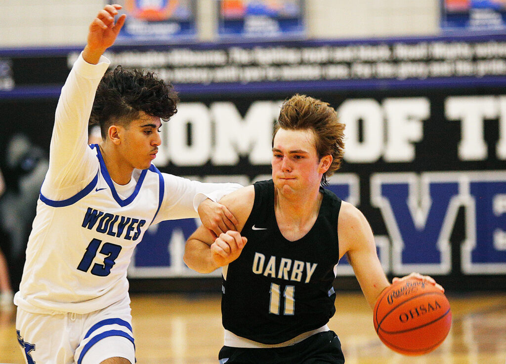 Hilliard Darby's Cooper Gilkerson drives to the basket