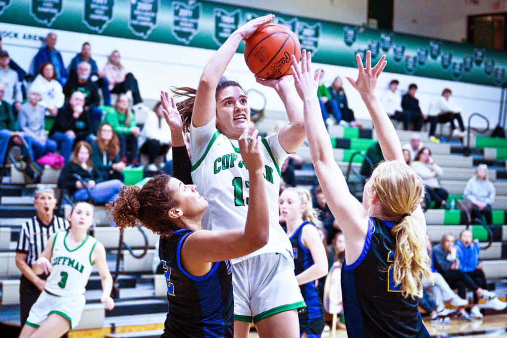 Dublin Coffman’s Avery Mather shoots basketball