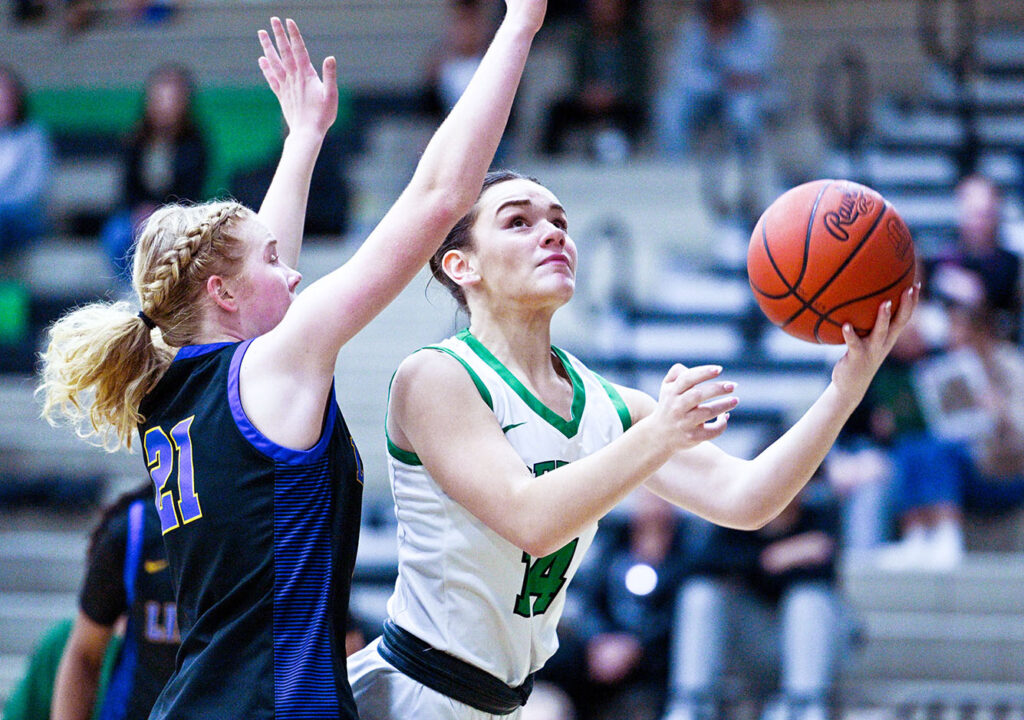 Dublin Coffman's Cadence Scott lays basketball up