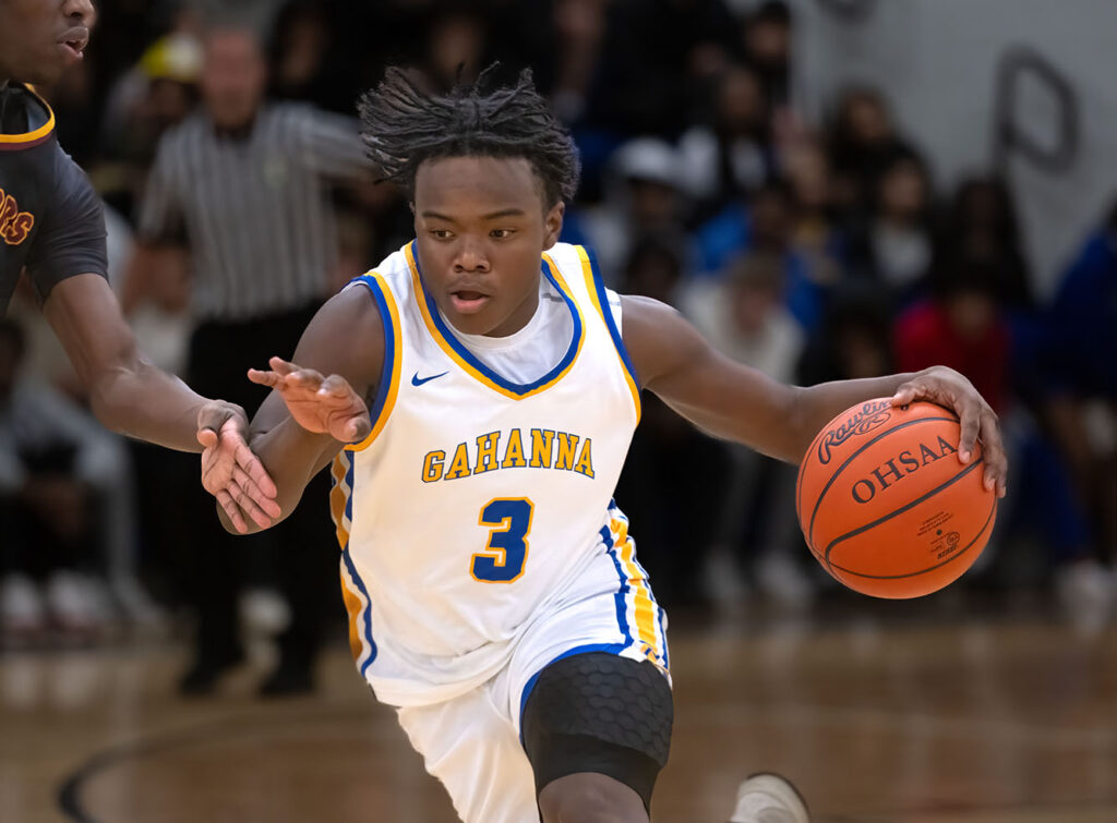 Gahanna’s Xavier Rogers dribbles