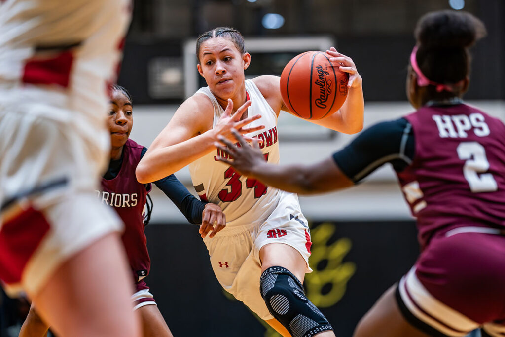 Johnstown's Kylie Sharp drives the lane