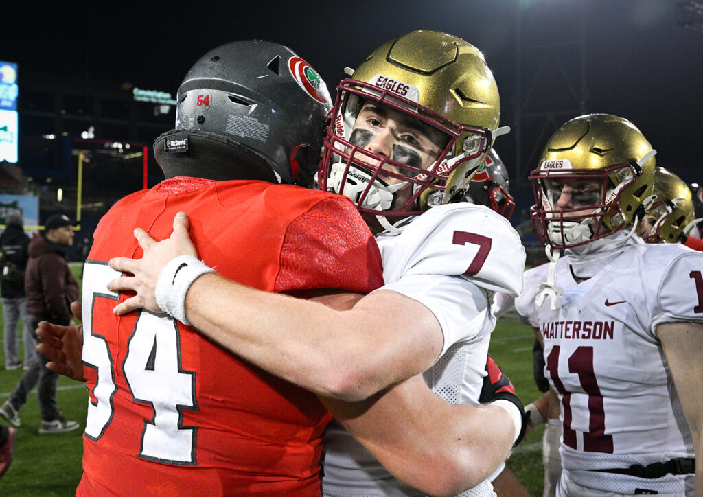 Bishop Watterson's A.J. McAninch congratulating opponent